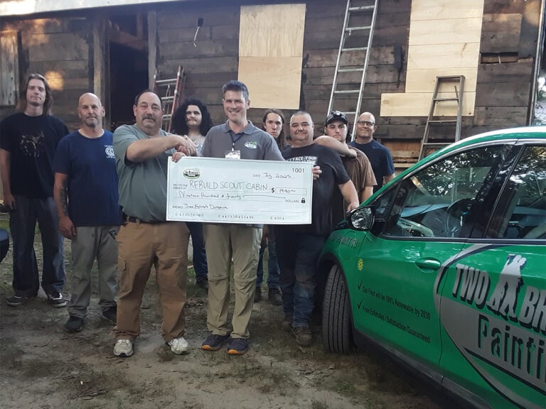 two brothers painting community support boy scouts