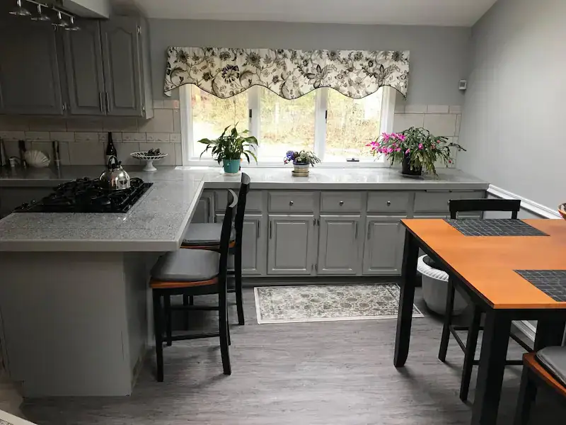 Freshly painted gray kitchen cabinets in a Rhode Island home